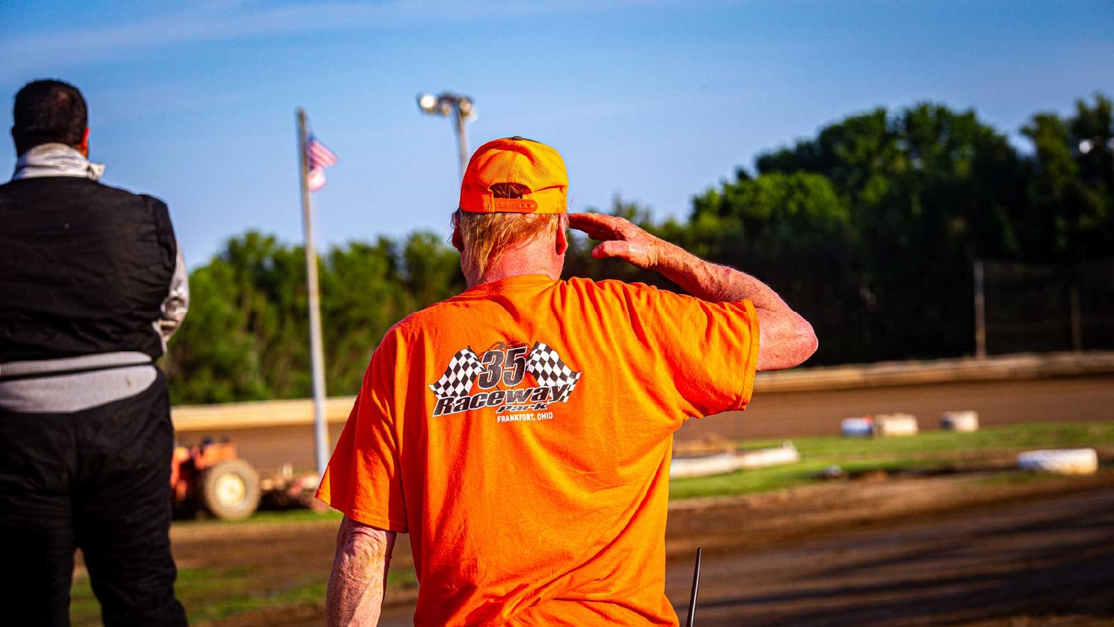 Track official on the front stretch