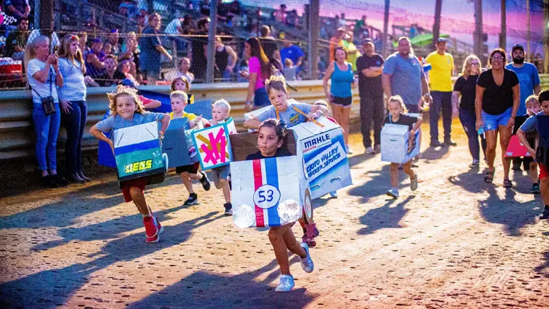 Kids and families on the front stretch at 35 Raceway Park